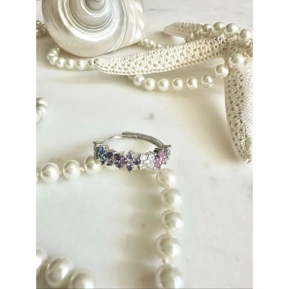 Louis flower shades of pink, blue, and purple cubic zirconia adjustable ring